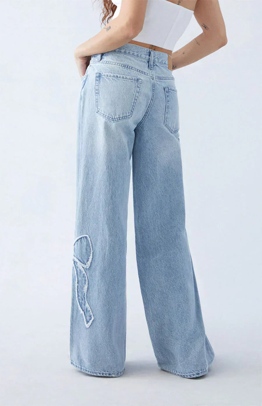 Roze strik baggy jeans