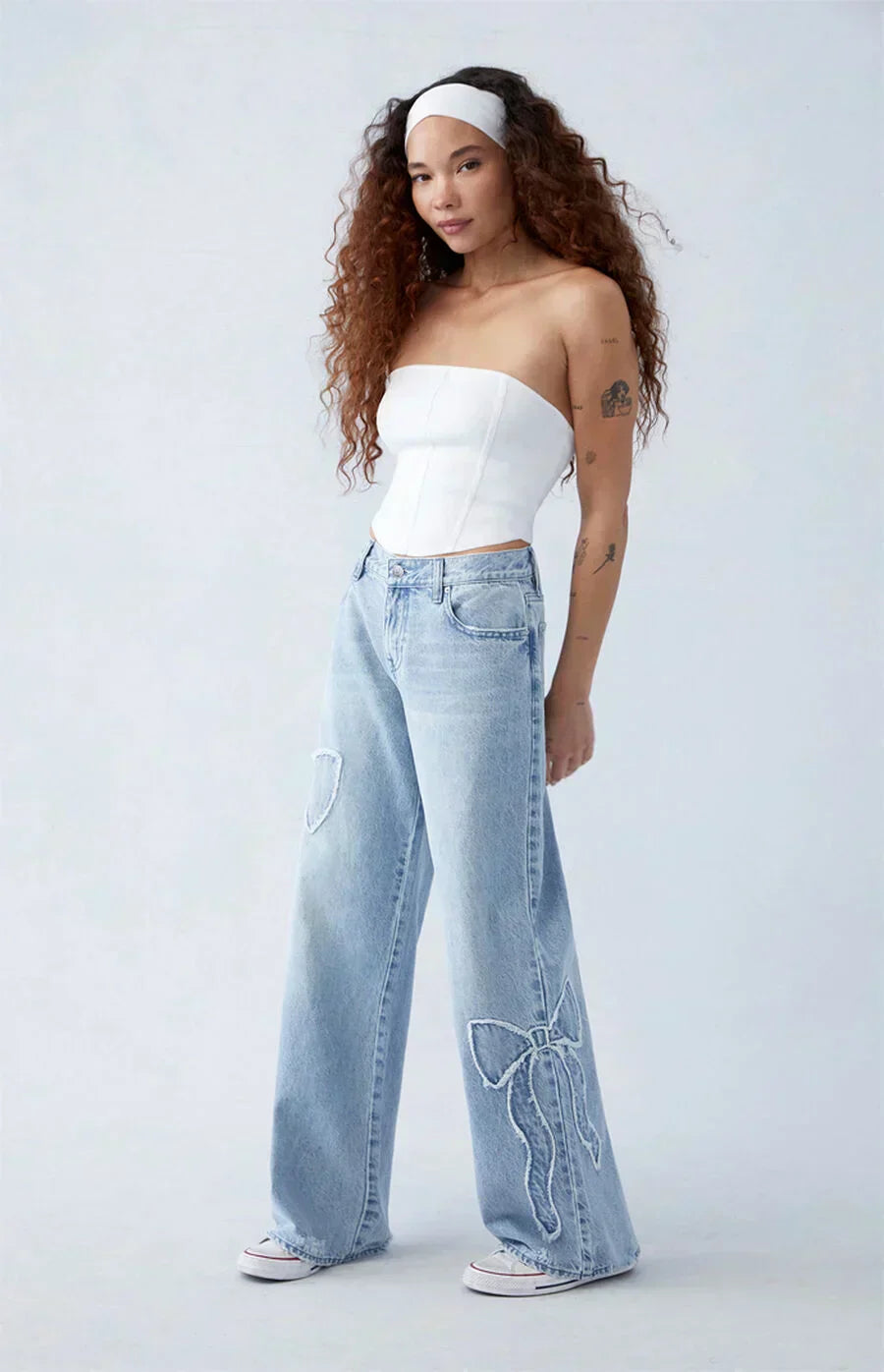 Roze strik baggy jeans